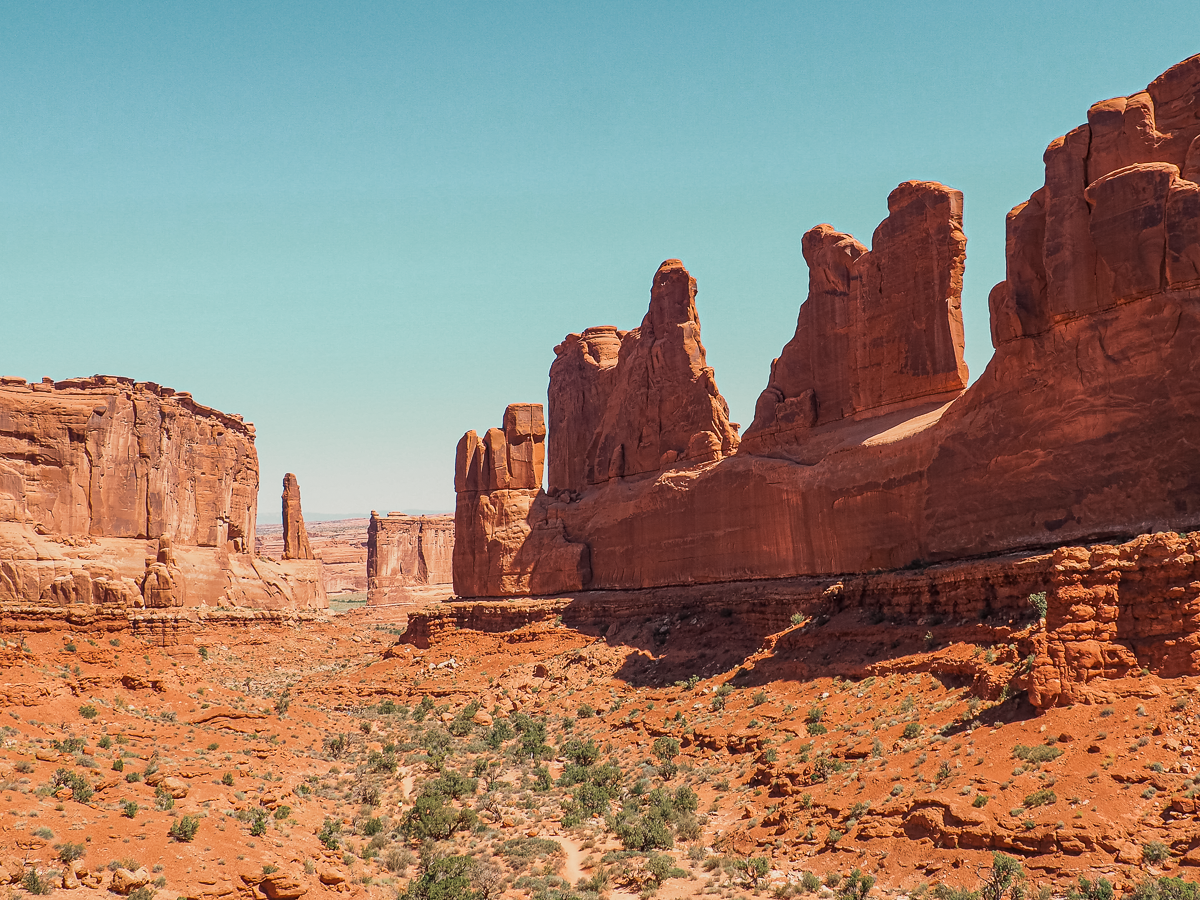 The rock formation of Wall Street in Arches National Park glowing in the sun