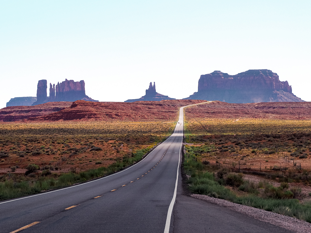 Driving Highway 163 towards the scenic rock formations of Monument Valley