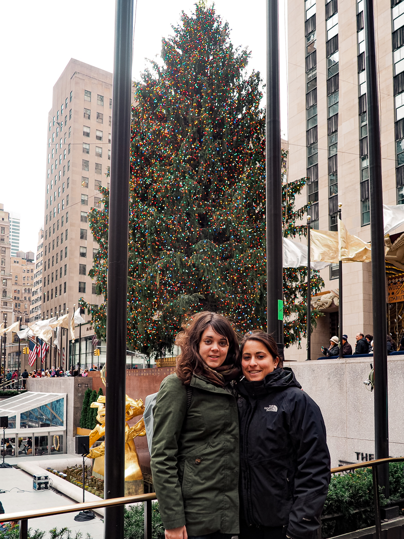 Rachel and Dana standing in front of the Rockefeller Tree in NYC