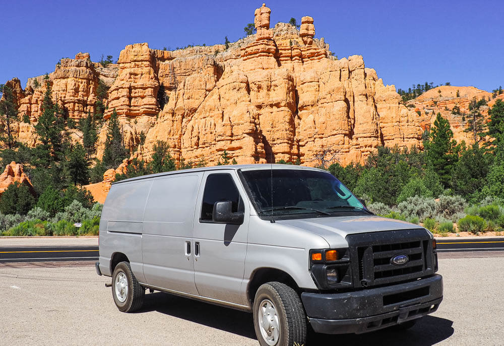 Our van in front of unique rock formations