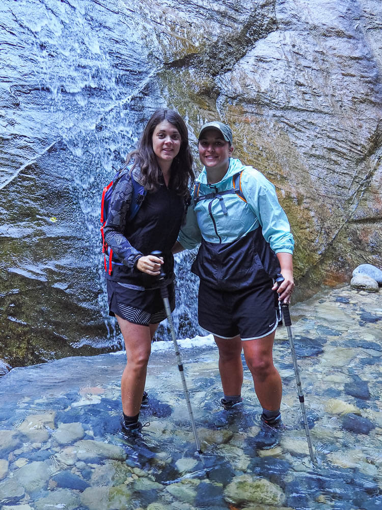 Rachel and I in front of a small waterfall when hiking the Narrows