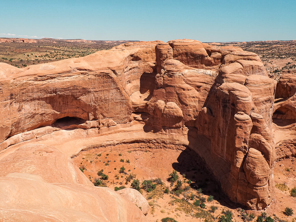 When you hike to Delicate Arch, you get rewarded with views of massive boulders