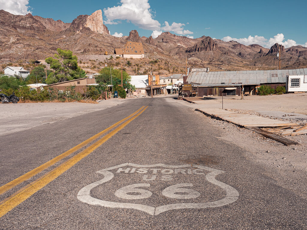 Historic US 66 signs on the road in Oatman Arizona