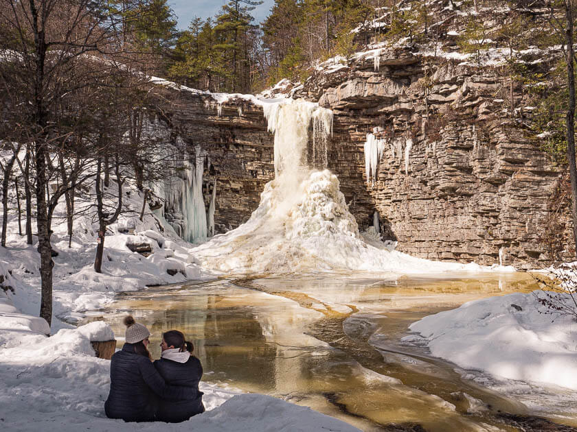 Us sitting in front of the frozen Awosting Falls in New York